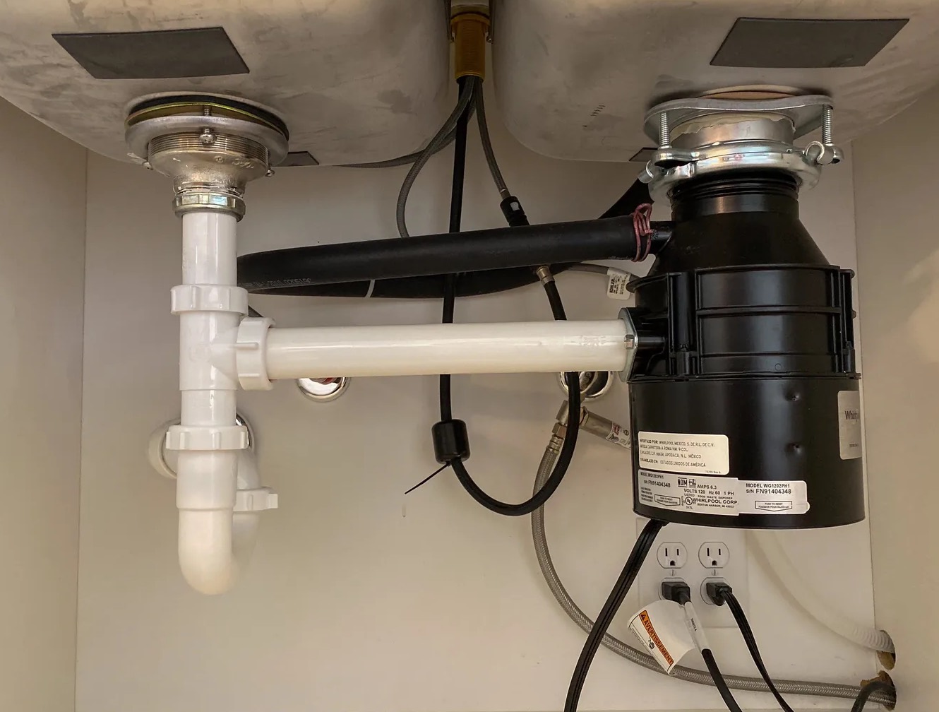 Leaky Garbage Disposal Cleanup in Frisco, TX